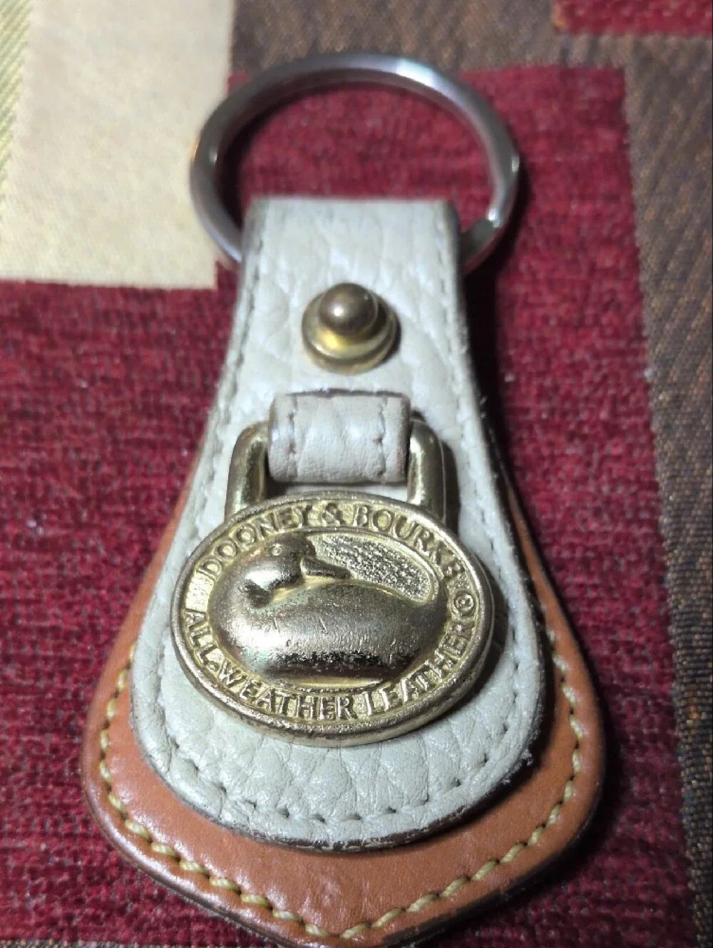 Dooney & Bourke White and Brown Leather Key Holder with Brass Medallion